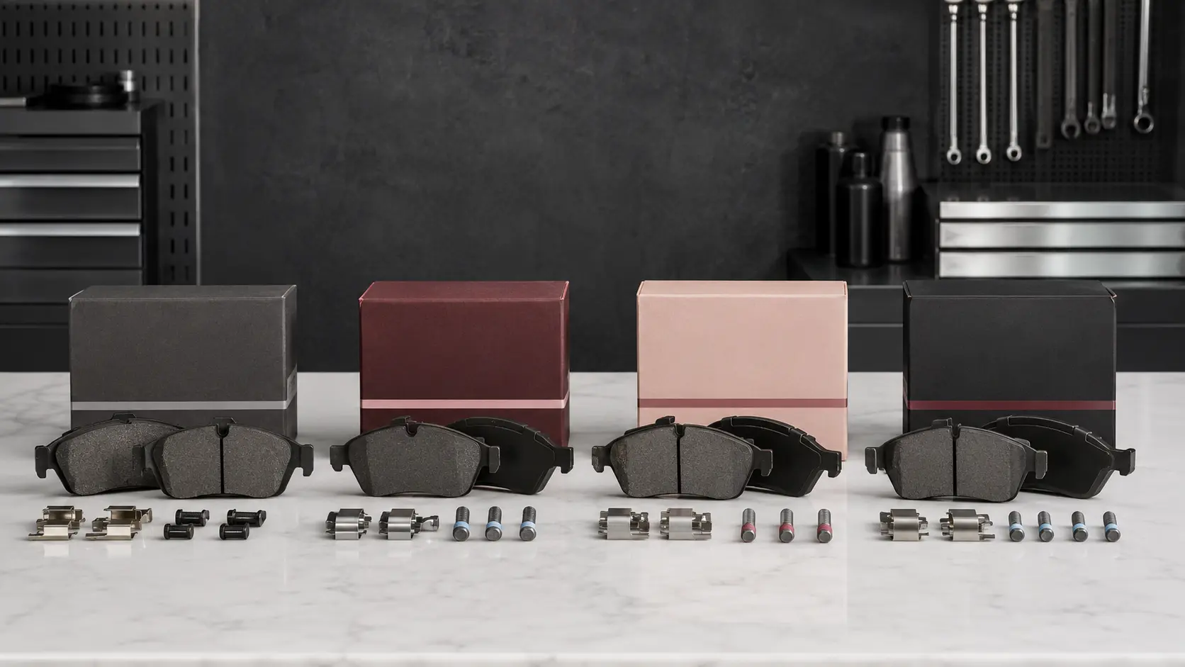 Four Audi brake pad parts routes arranged for comparison before quotation